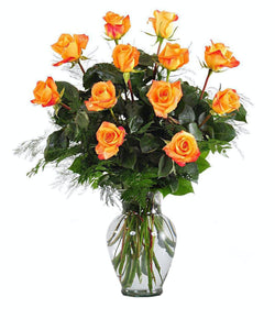 A dozen roses in a vase